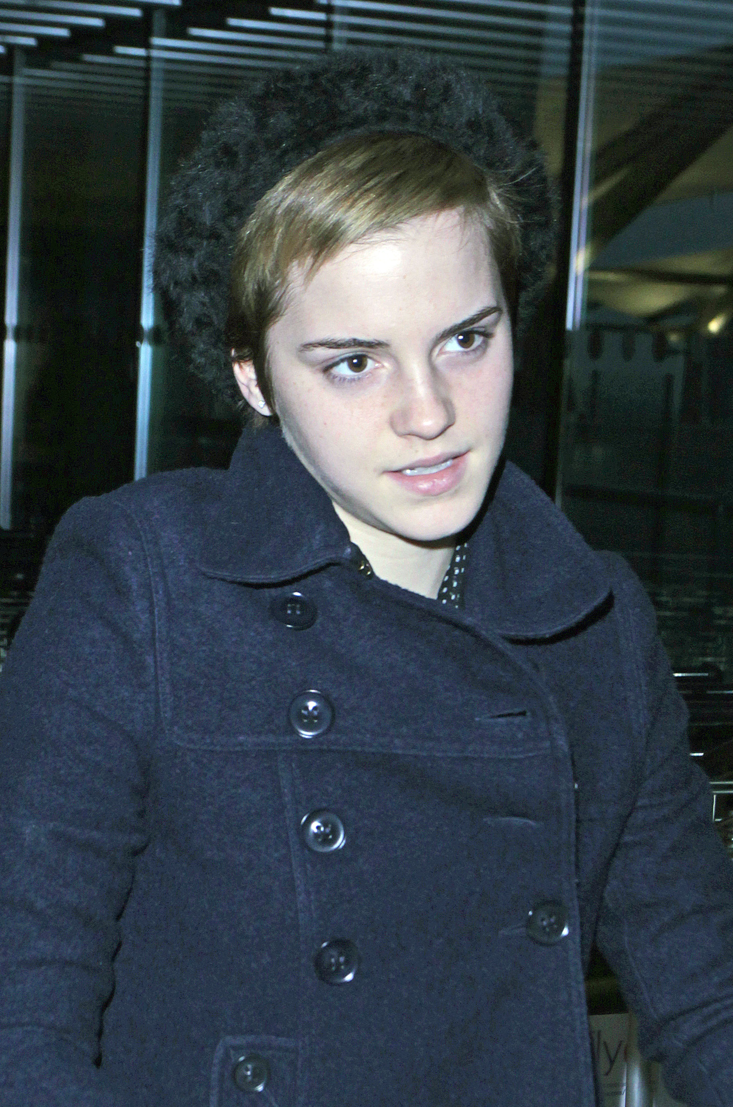 Preppie Emma Watson at Heathrow Airport 18