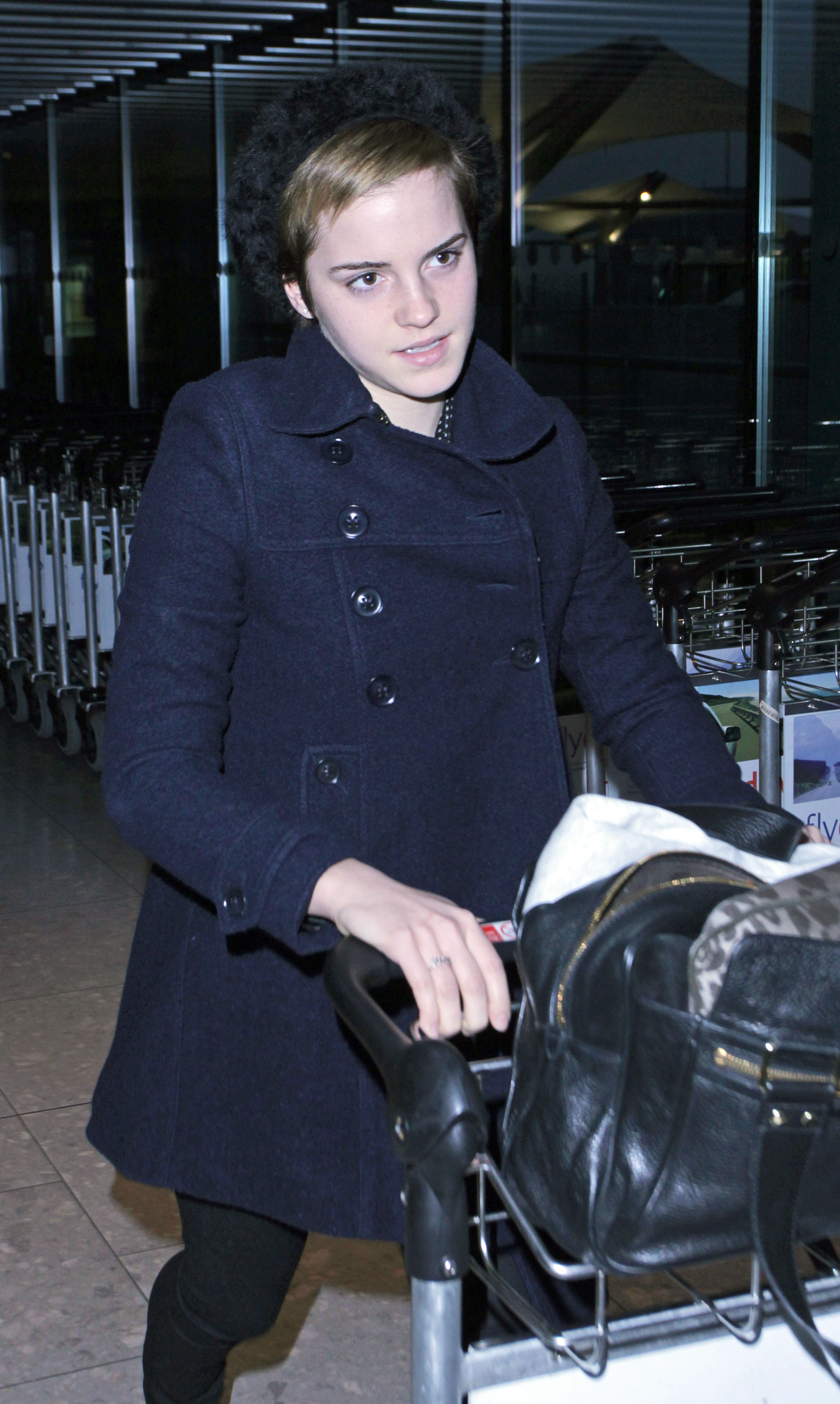 Preppie Emma Watson at Heathrow Airport 19